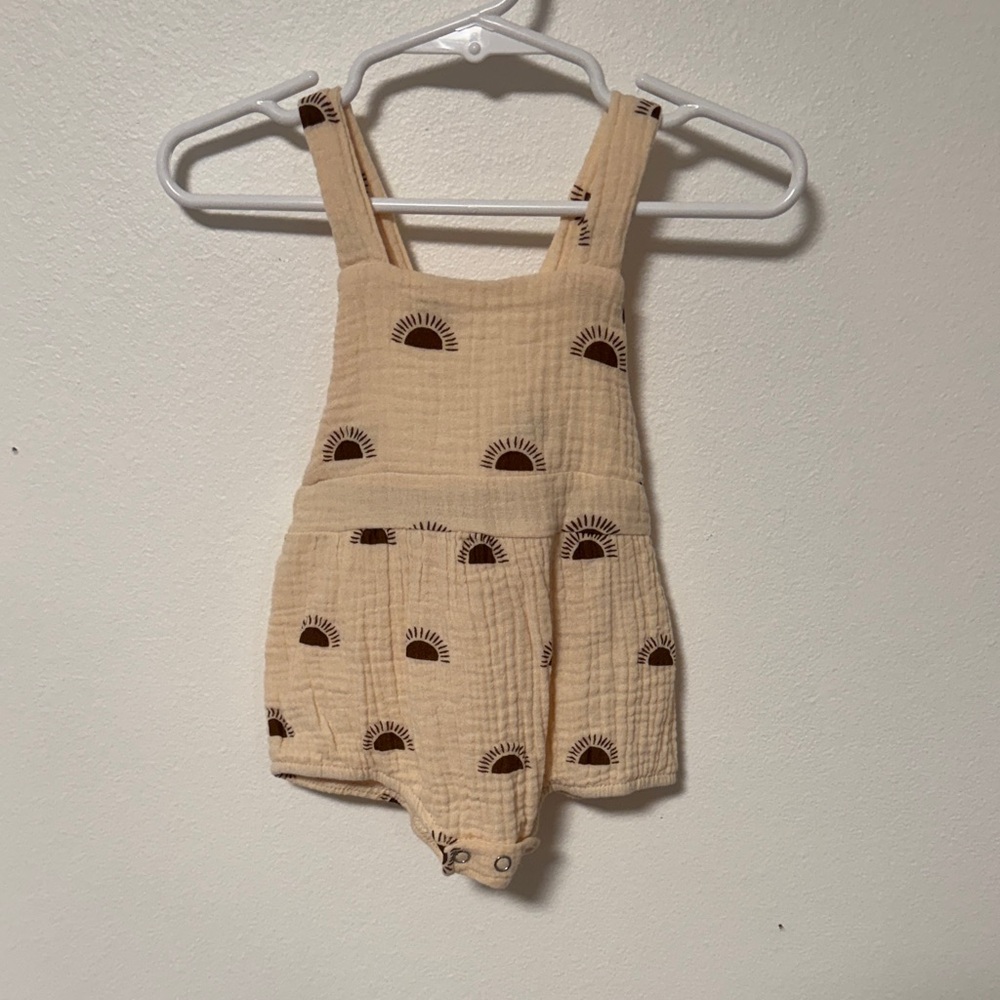 Adorable Beige Baby Romper with Sun Pattern